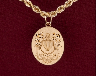 etched gold pendant on gold chain